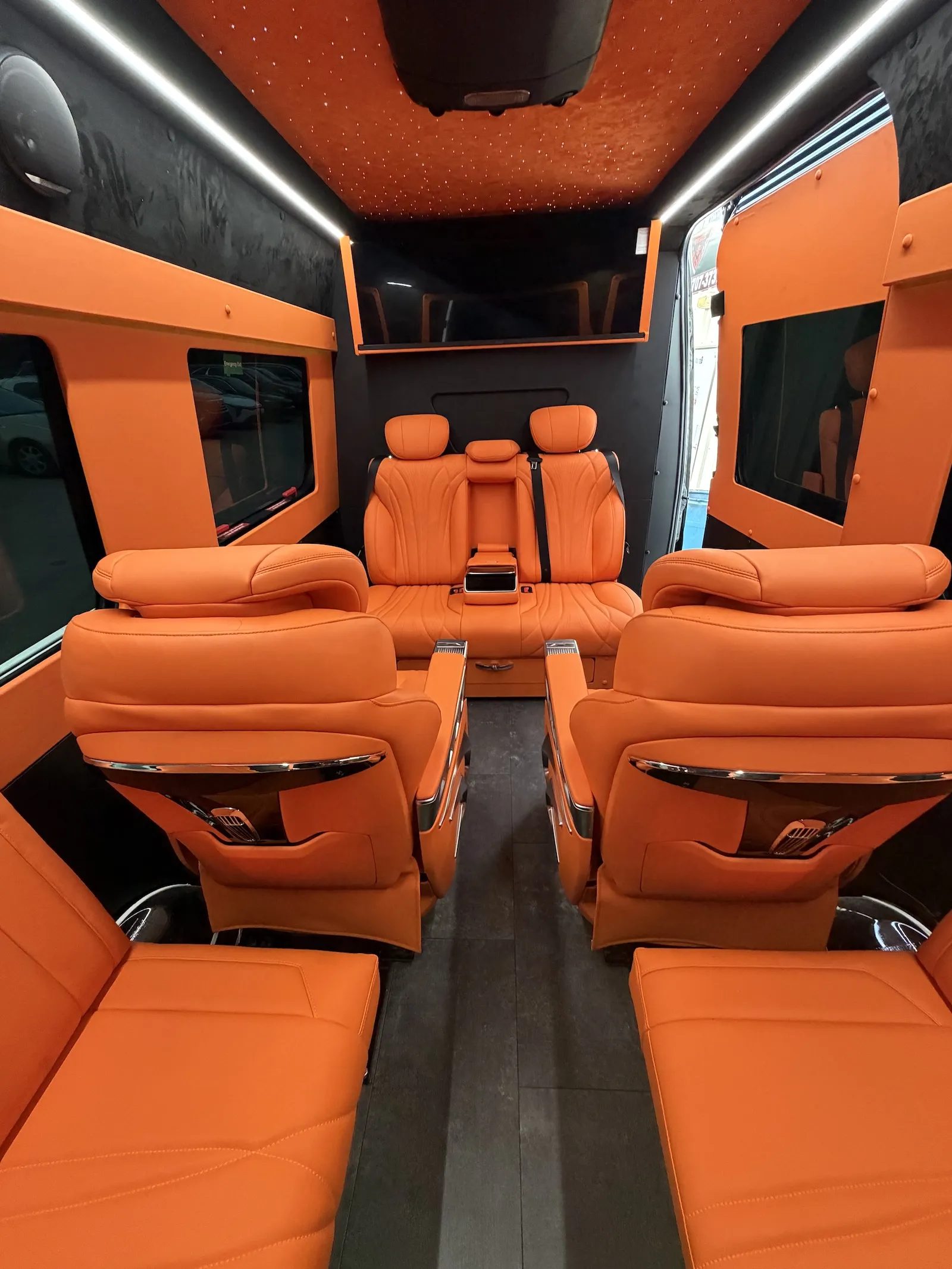 party bus with orange interior inside houston
